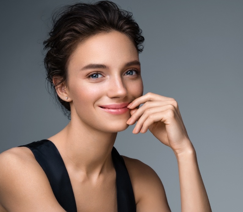 Woman looking great after esthetic treatment