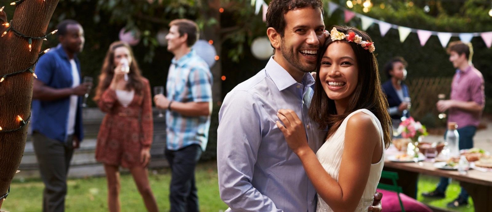 Man and woman smiling on their wedding day