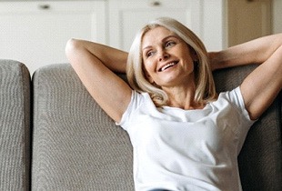 Woman smiling on couch
